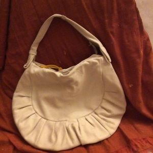 Sofia C. Butter soft handbag